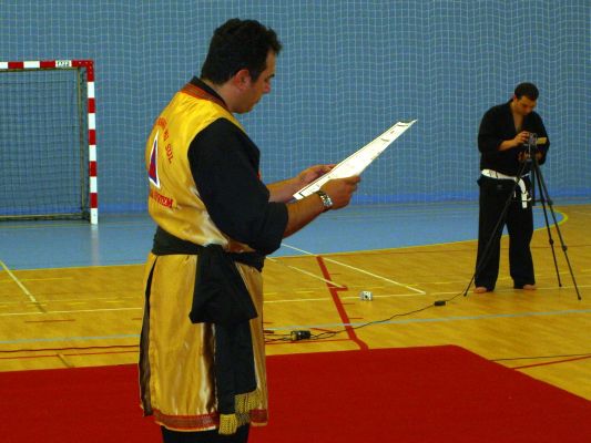 Kuk Sa Nim reads Asst. Inst. Sergio Anes certificate